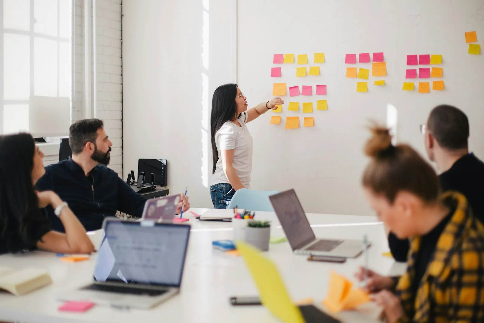 Agency team planning a campaign with sticky notes