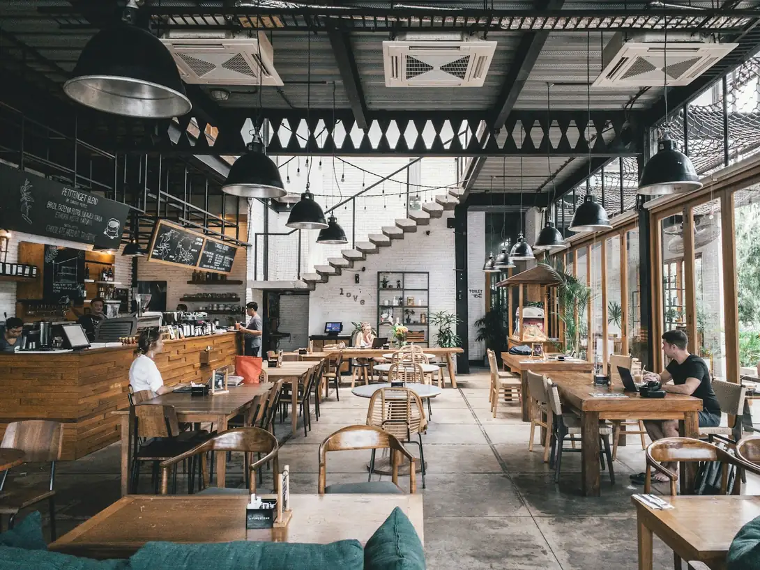 Industrial café interior with tables