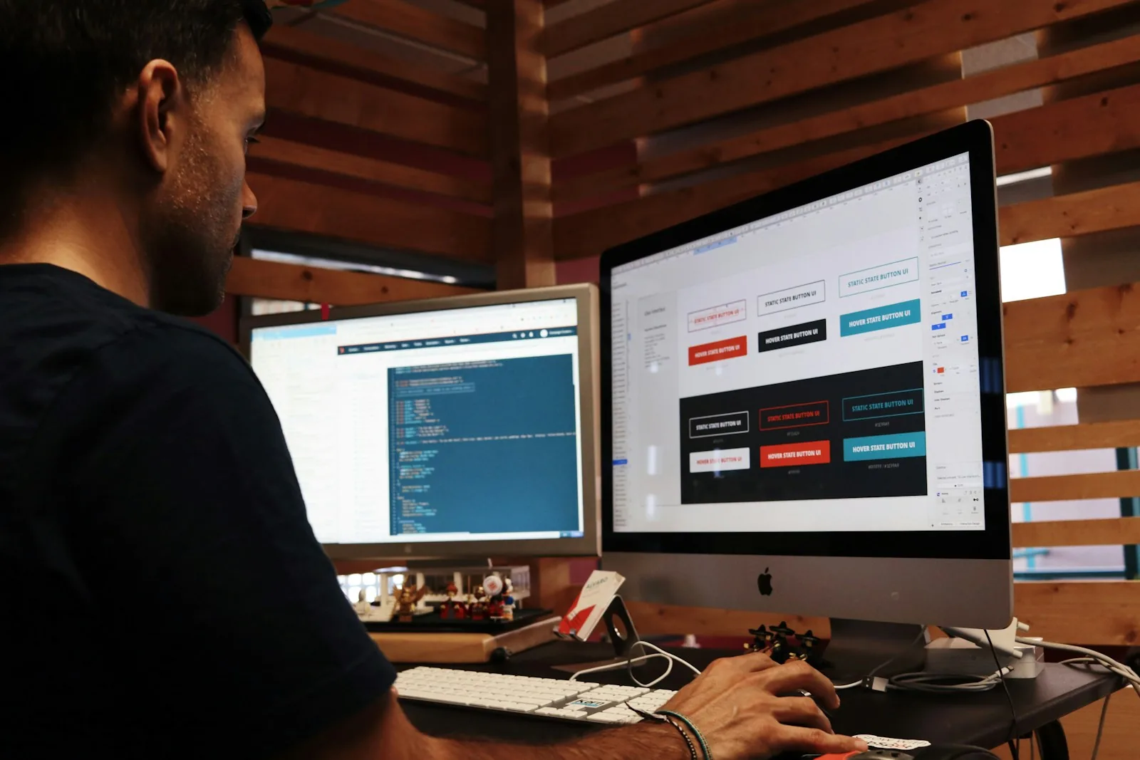 Developer working at two screens