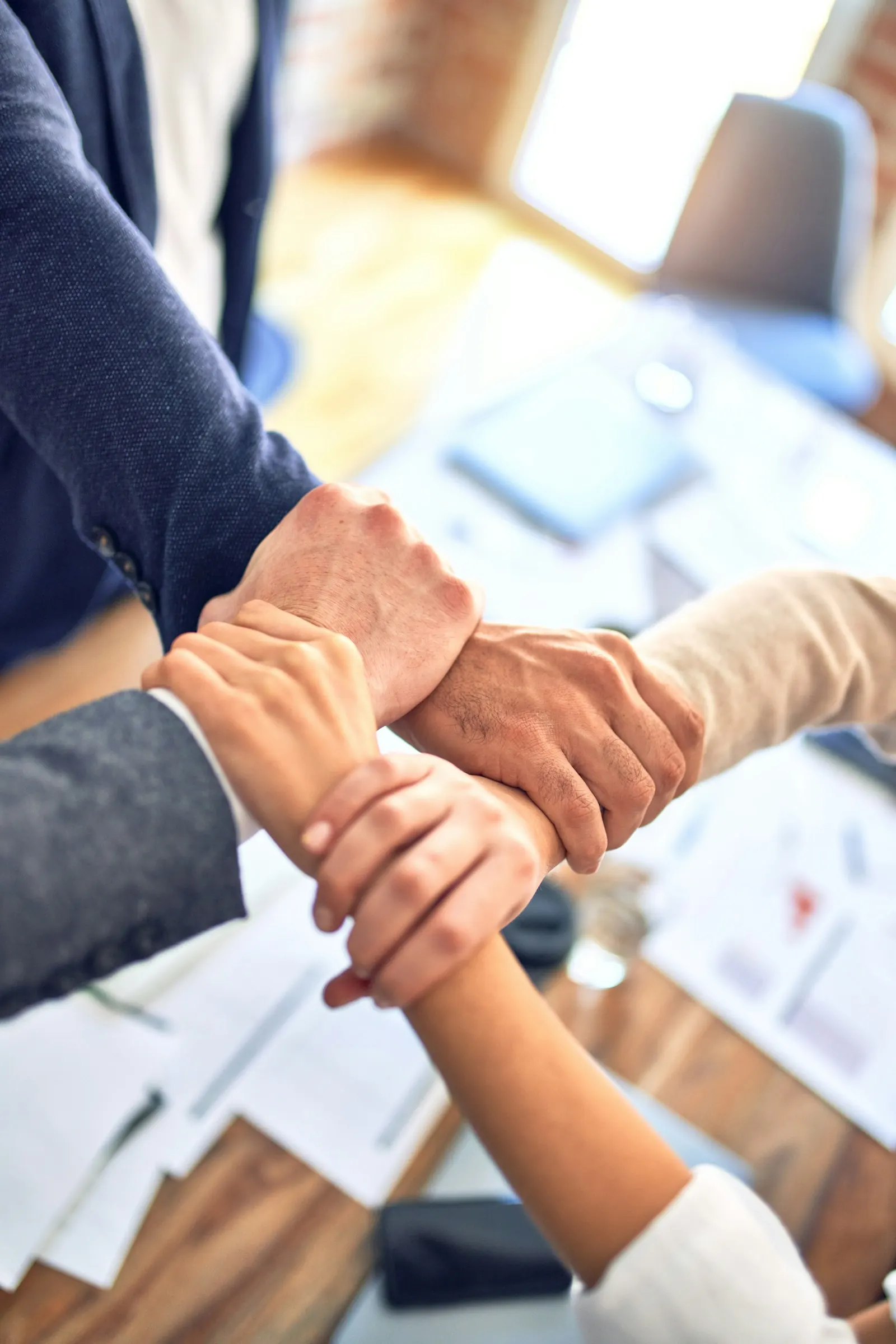 Stacked hands showing teamwork